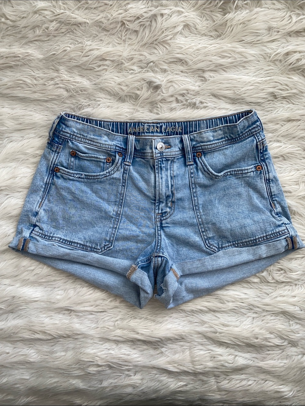 American Eagle | Dreamy Drape Easy Shortie Light Wash Denim Rolled-Hem Shorts